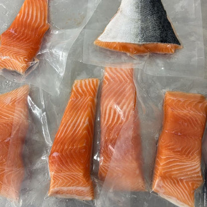 Fresh Sashimi Grade New Zealand Ora King Salmon fillet portion with individual airtight packaging.  